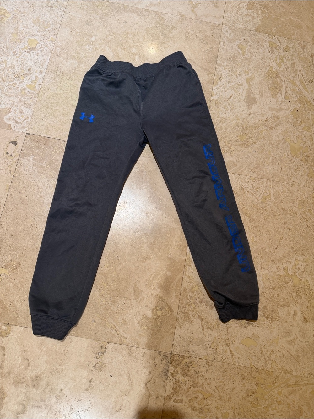 Under Armour kids Black Sweatpants with Blue Logo Strip